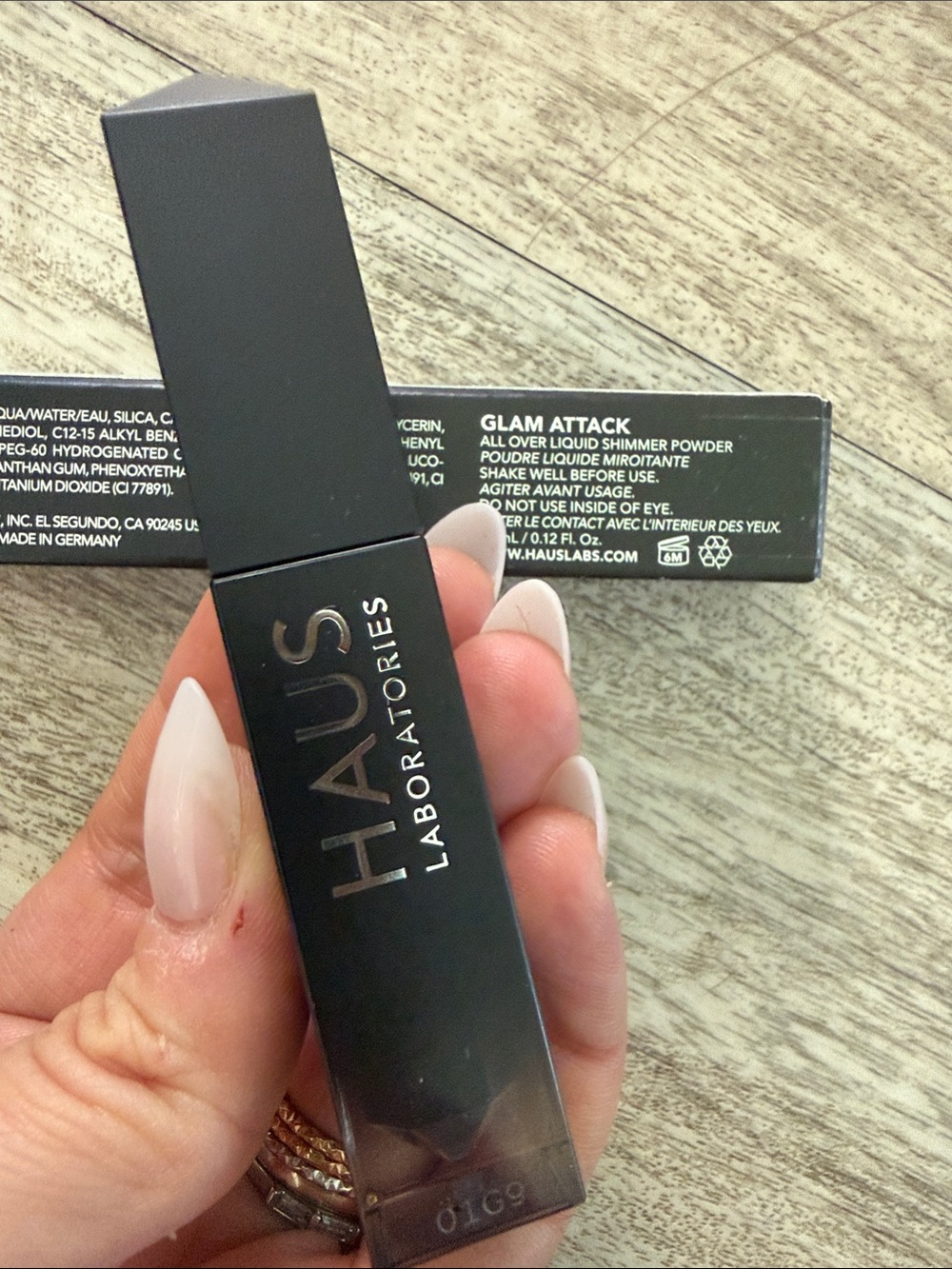 HAUS Laboratories Glam Attack Liquid Shimmer Powder chained ballerina